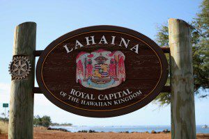 A sign that says lahaina royal capital of the hawaiian kingdom.