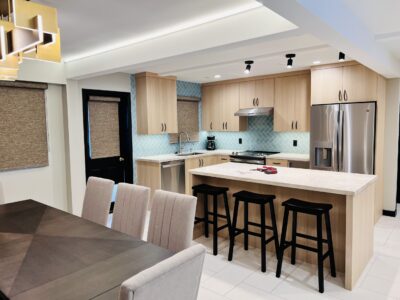 Modern kitchen island with three bar stools