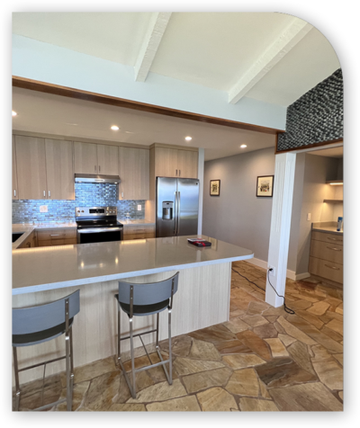 Modern kitchen island with two barstools